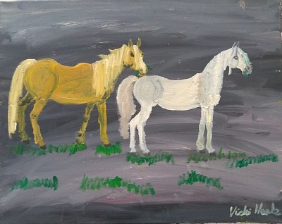 Palomino and a grey two horses