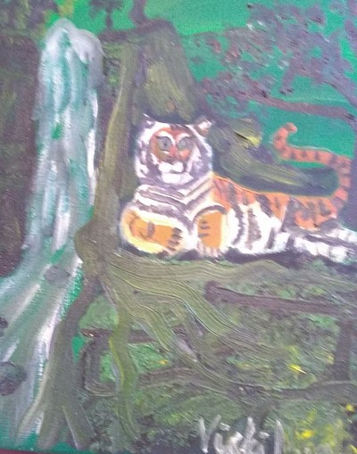 Tiger by waterfall